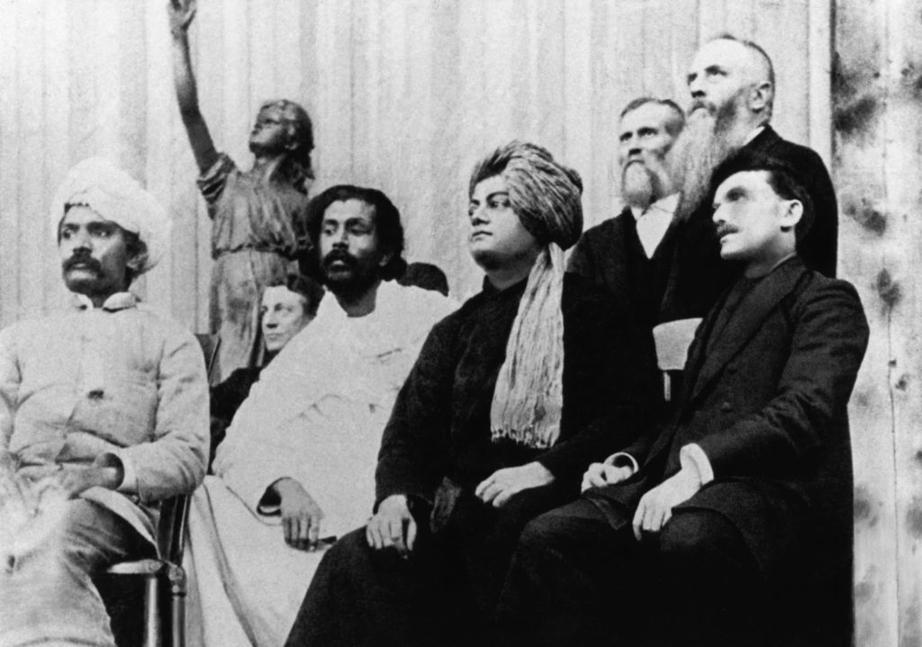 Religiösa ledare på mötet i Chicago. Några i turban och med indisk-pakistanskt utseende, andra kaukasier med svarta rockar
