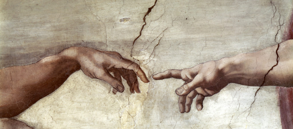 Detalj från Sixtinska kapellet. Guds finger möter Adams finger.