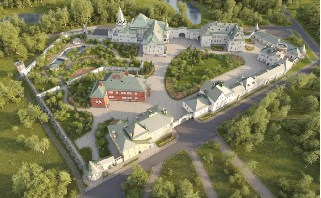 Stort slottsområde, inhägnat av en mur